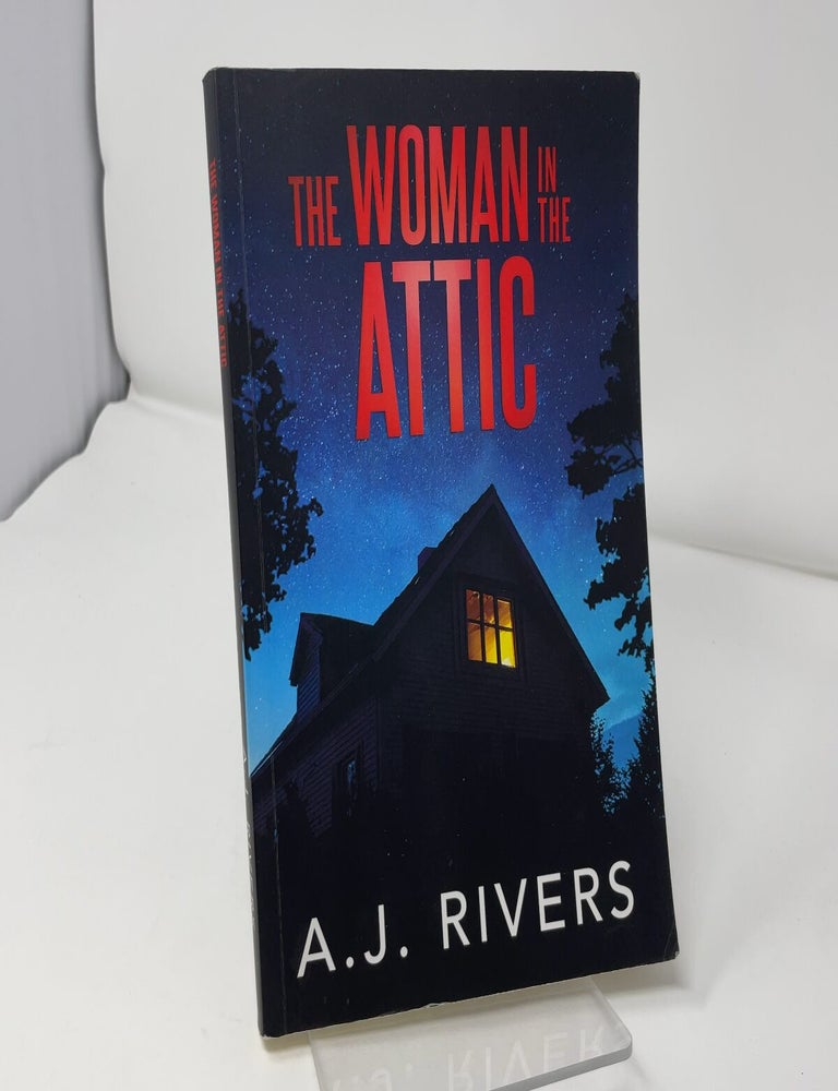 Item #425314 The Woman in the Attic. A. J. Rivers.